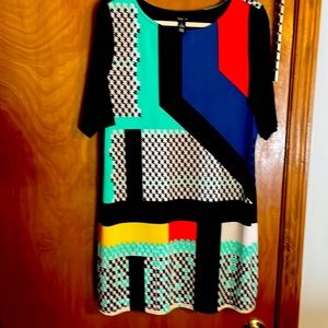 Abstract colored midi in size Large polyester with 5% spandex.